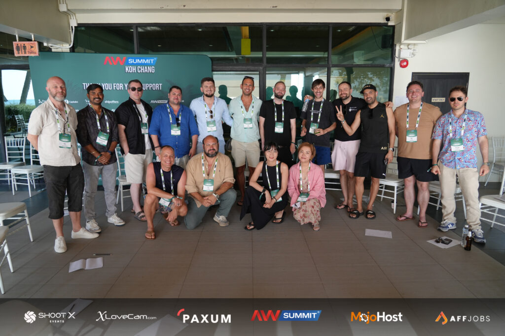 people in an conference posing for picture